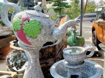 Bình trà đổ nước phong thủy